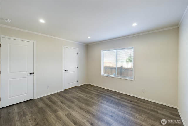 interior space featuring ornamental molding, dark wood-style flooring, recessed lighting, and baseboards