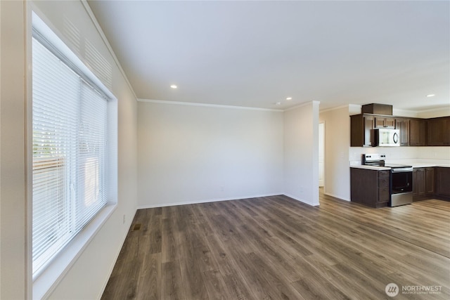 unfurnished living room with crown molding, baseboards, wood finished floors, and recessed lighting