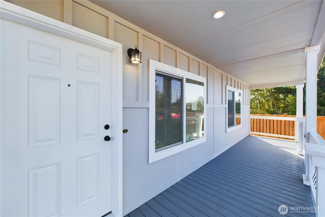 deck featuring covered porch