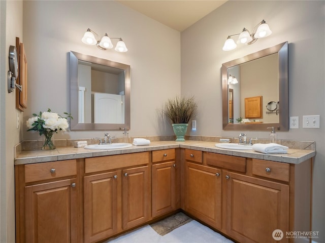 full bath with double vanity and a sink