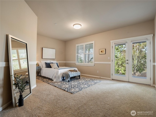 carpeted bedroom featuring access to outside, french doors, multiple windows, and baseboards