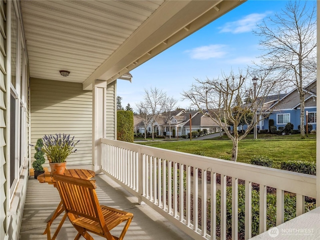 balcony featuring a residential view