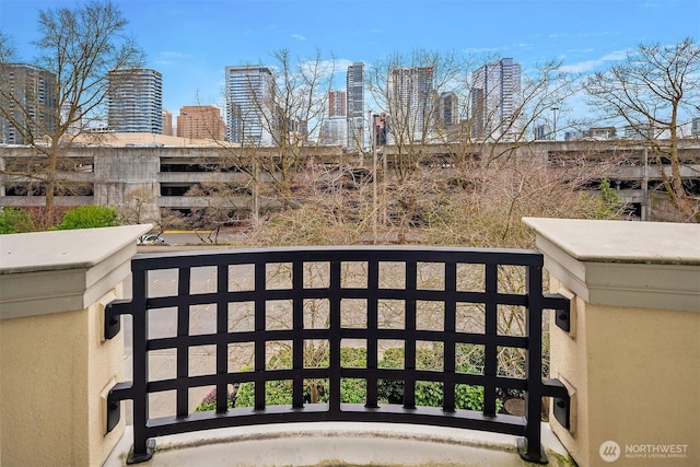 exterior space featuring a balcony and a city view