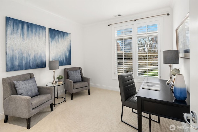 office space featuring visible vents, baseboards, carpet flooring, and crown molding