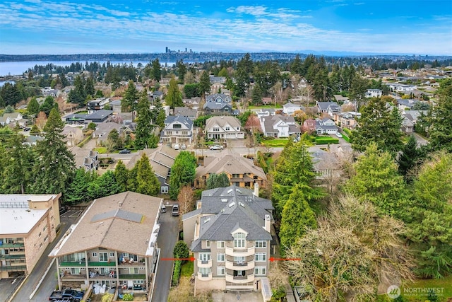 aerial view featuring a residential view and a water view