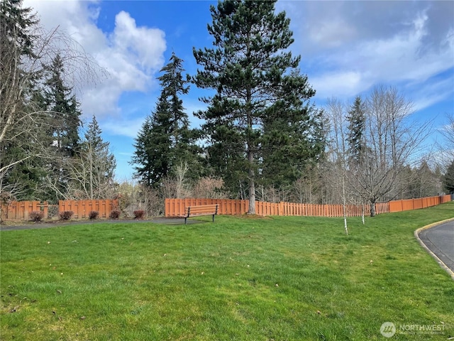 view of yard with fence