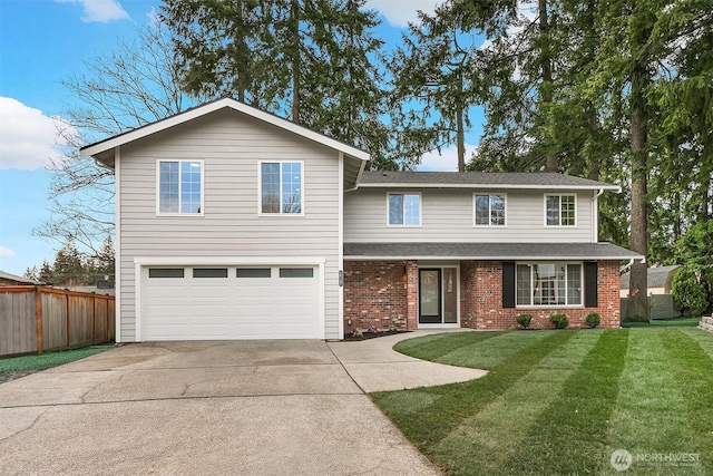 traditional home featuring fence, a front lawn, concrete driveway, and brick siding