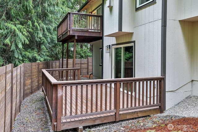 deck with a fenced backyard