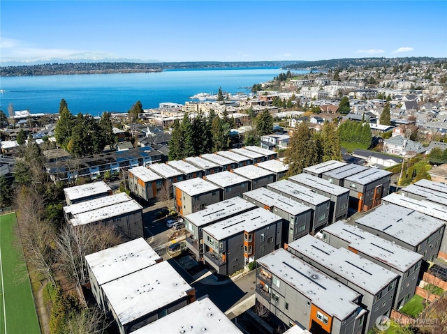 birds eye view of property featuring a water view