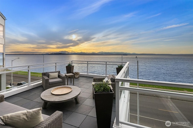 1514 Alki Ave SW, Seattle, WA 98116 - view of patio / terrace with a water view
