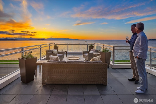 1514 Alki Ave SW, Seattle, WA 98116 - patio terrace at dusk with outdoor lounge area and a water view