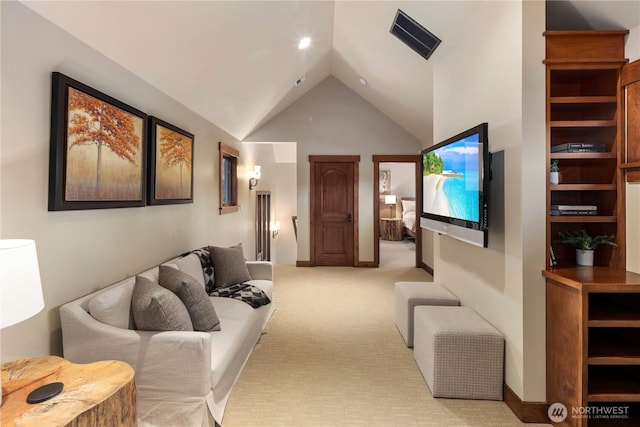 living room with baseboards, high vaulted ceiling, visible vents, and light colored carpet