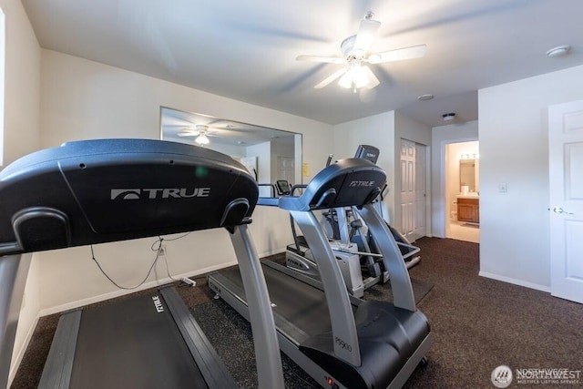workout room featuring ceiling fan, carpet floors, and baseboards