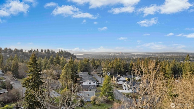 drone / aerial view with a view of trees