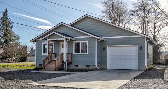 view of front facade featuring a garage, concrete driveway, and crawl space