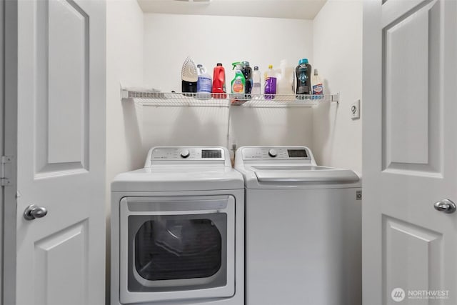 laundry area featuring laundry area and independent washer and dryer