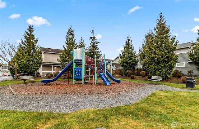 communal playground with a lawn