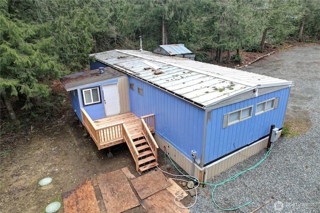 view of front of property featuring metal roof