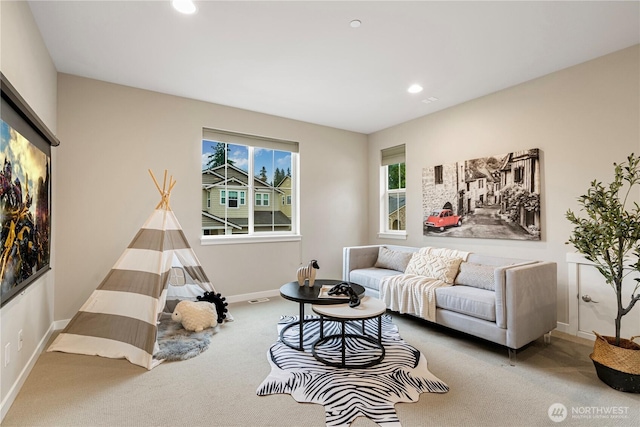 carpeted living area featuring recessed lighting, visible vents, and baseboards