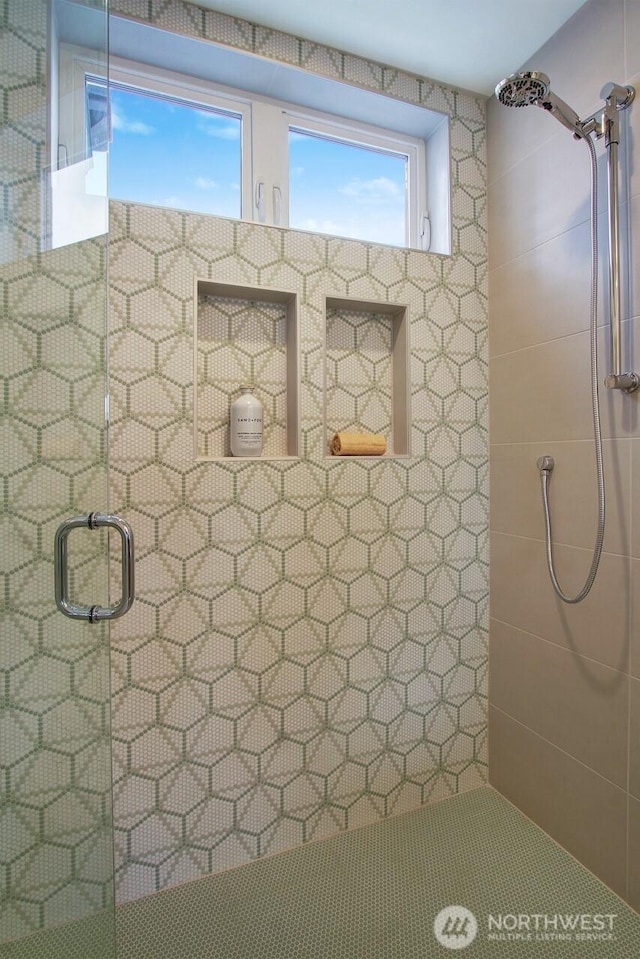 bathroom with a stall shower