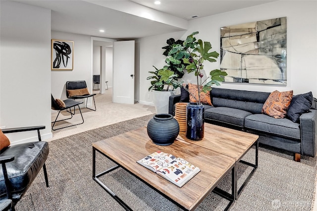 living area featuring baseboards, carpet flooring, and recessed lighting