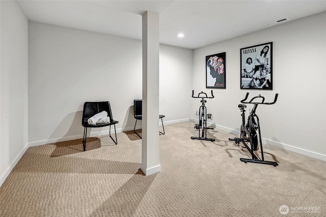 exercise room featuring baseboards, visible vents, and recessed lighting