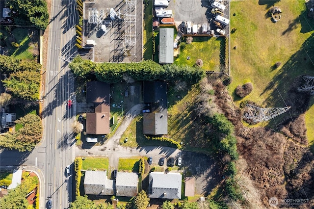 birds eye view of property with a residential view