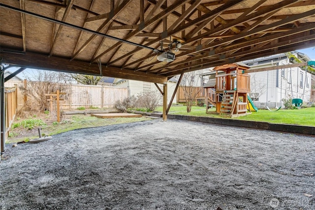 view of patio / terrace with a playground and fence