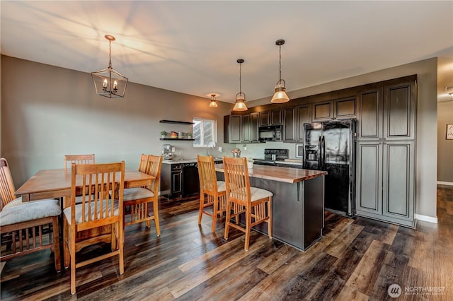 kitchen with open shelves, dark wood-style flooring, a center island, black appliances, and pendant lighting