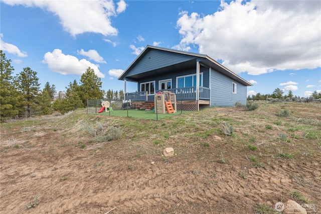 exterior space featuring a wooden deck