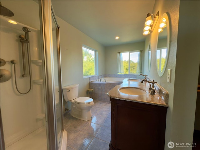 bathroom with toilet, a shower stall, a bath, tile patterned floors, and double vanity