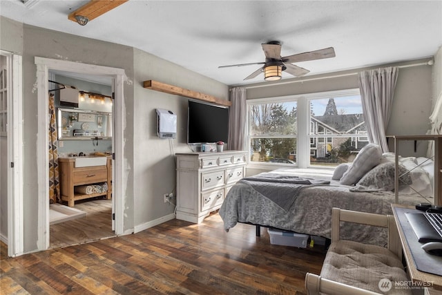 bedroom with ceiling fan, baseboards, and wood finished floors