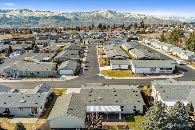 birds eye view of property featuring a residential view and a mountain view