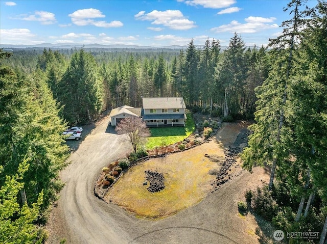 aerial view featuring a forest view