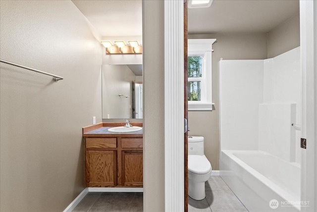 full bathroom featuring baseboards, vanity, toilet, and tile patterned floors