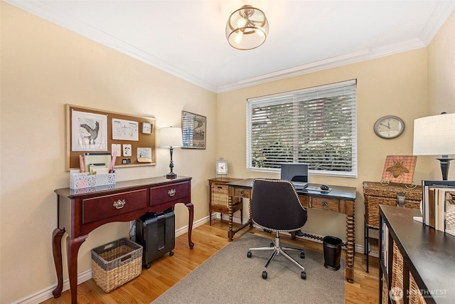 home office featuring baseboards, wood finished floors, and ornamental molding