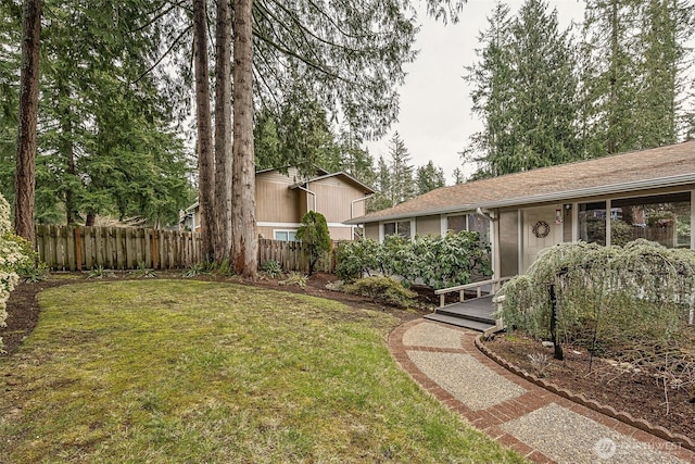 view of yard featuring fence