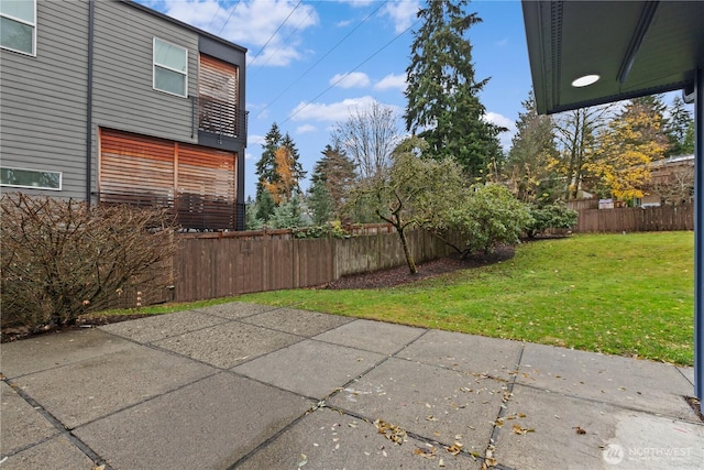 view of patio featuring fence