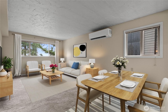 living area featuring a textured ceiling, an AC wall unit, and carpet flooring