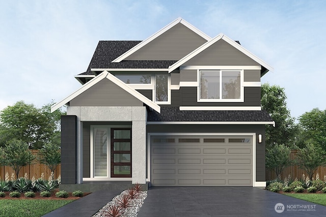 view of front of property with a shingled roof, fence, driveway, and an attached garage