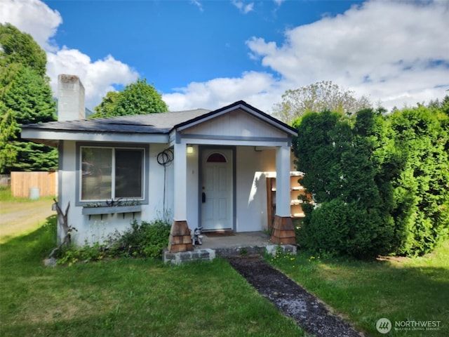 160 Gharet Rd, Randle, WA 98377 - bungalow-style home with a front lawn, a chimney, and stucco siding