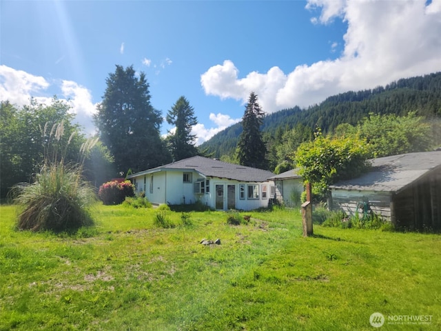 160 Gharet Rd, Randle, WA 98377 - back of property with a mountain view and a view of trees