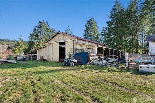 view of outbuilding featuring an outbuilding and an exterior structure