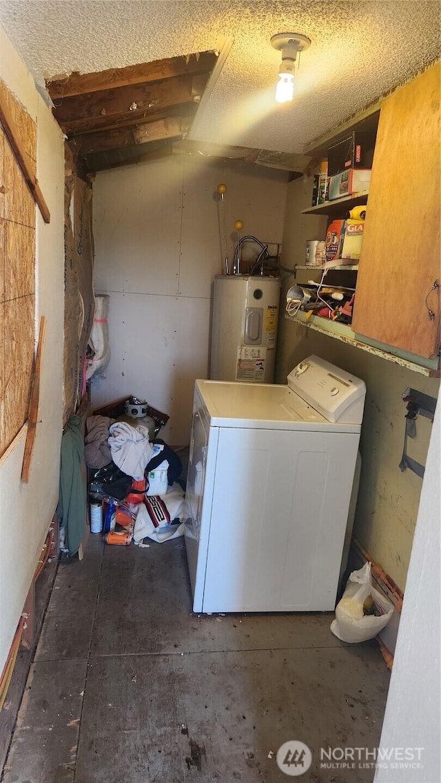 laundry area with laundry area, water heater, and washer / clothes dryer