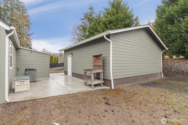 view of home's exterior featuring a patio area and central AC unit