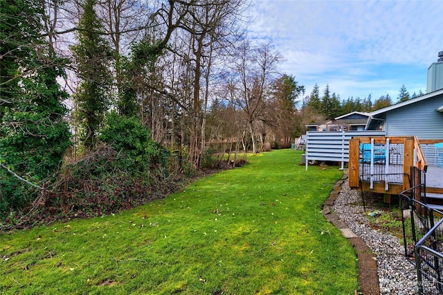 view of yard with a deck