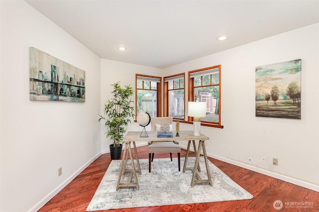 office featuring recessed lighting, wood finished floors, and baseboards