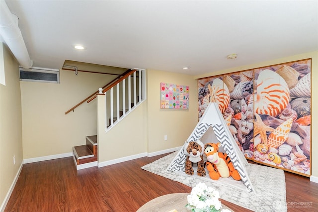 playroom featuring recessed lighting, baseboards, and wood finished floors