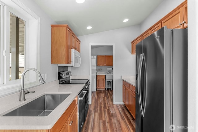 1000 Sr 150, Manson, WA 98831 - kitchen with recessed lighting, brown cabinetry, appliances with stainless steel finishes, a sink, and dark wood-style floors