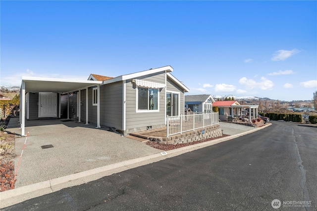1000 Sr 150, Manson, WA 98831 - manufactured / mobile home featuring driveway and an attached carport